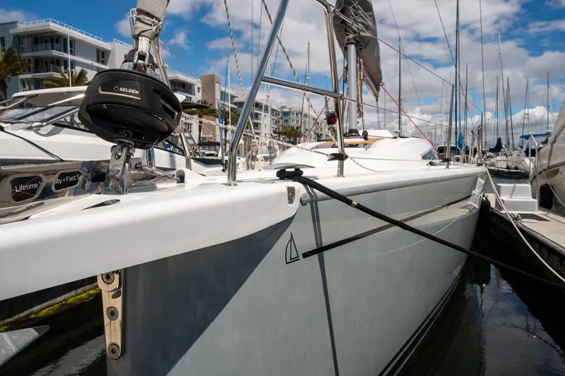 Anthem Yacht Photos Pics 2022 Dehler 34 sailboat docked at marina, showcasing sleek design and modern rigging.