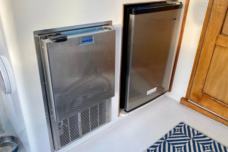 Lazy Livin' Yacht Photos Pics Stainless steel appliances on 1971 Hatteras 43 Double Cabin yacht interior.