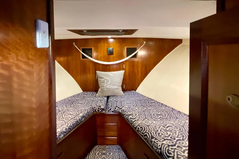 Lazy Livin' Yacht Photos Pics 1971 Hatteras 43 Double Cabin interior with twin beds and wooden finish.