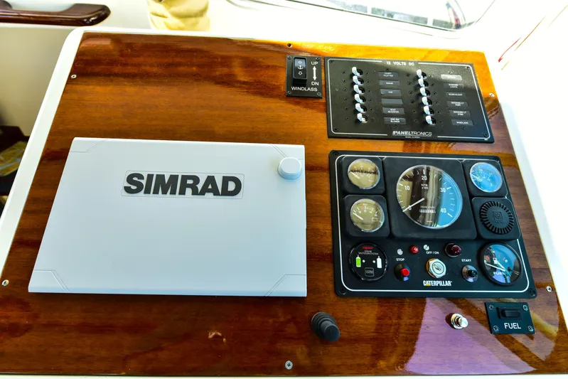 About Time Yacht Photos Pics Control panel of a 1998 Duffy 35 Downeast Cruiser with Simrad navigation system.