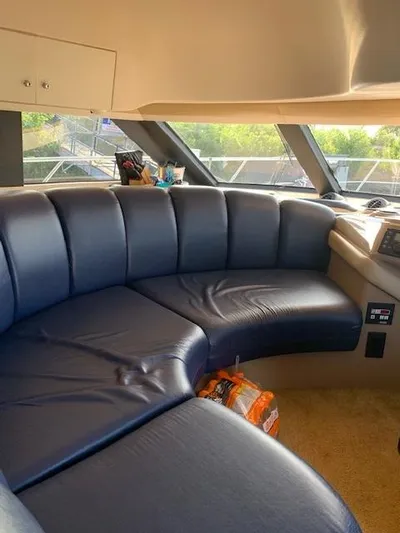  Yacht Photos Pics Interior of 1999 Carver 450 Voyager yacht with blue leather seating.