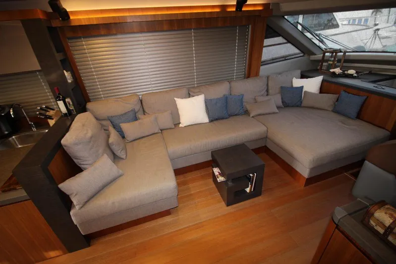  Yacht Photos Pics Luxurious interior of 2013 Monte Carlo Yachts MCY 65 with spacious seating and modern design.