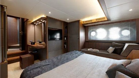  Yacht Photos Pics Luxurious interior of 2013 Monte Carlo Yachts MCY 65 with modern furnishings and elegant design.