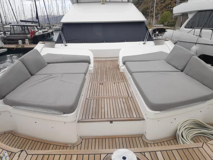  Yacht Photos Pics Luxury Monte Carlo Yachts MCY 65, 2013 model, featuring spacious deck seating.