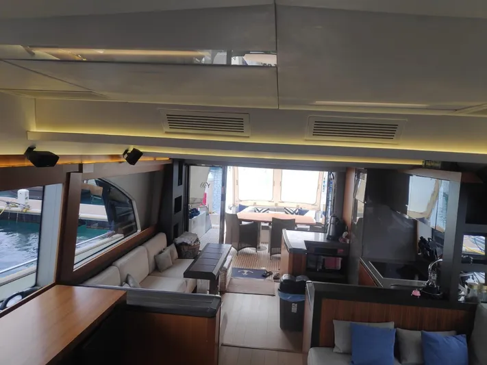  Yacht Photos Pics Interior of 2013 Monte Carlo Yachts MCY 65, featuring modern design and comfortable seating.