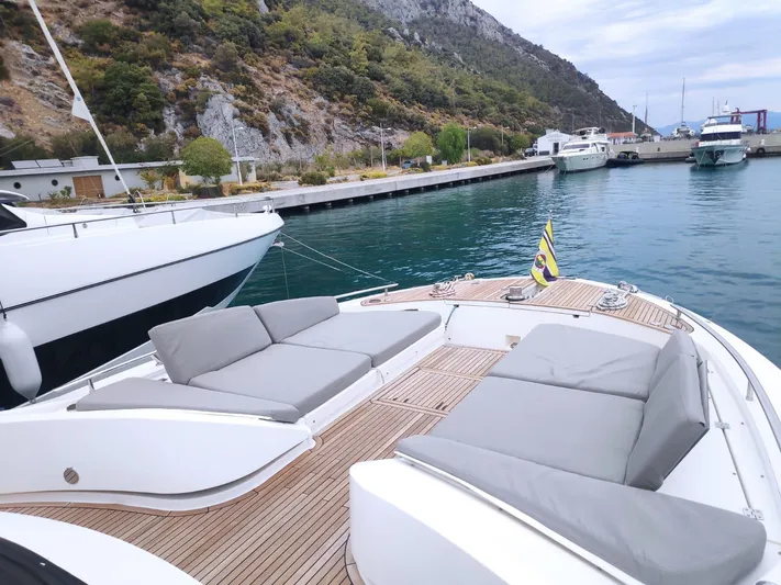  Yacht Photos Pics Luxurious 2013 Monte Carlo Yachts MCY 65 with spacious deck and scenic marina view.