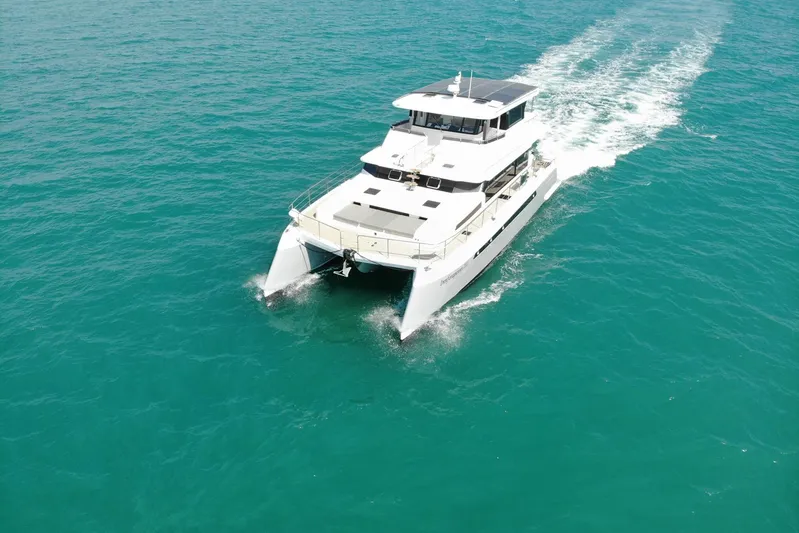 Innforapenny III Yacht Photos Pics 2020 PowerPlay Catamarans Longreach 1900 Expedition cruising on open sea.