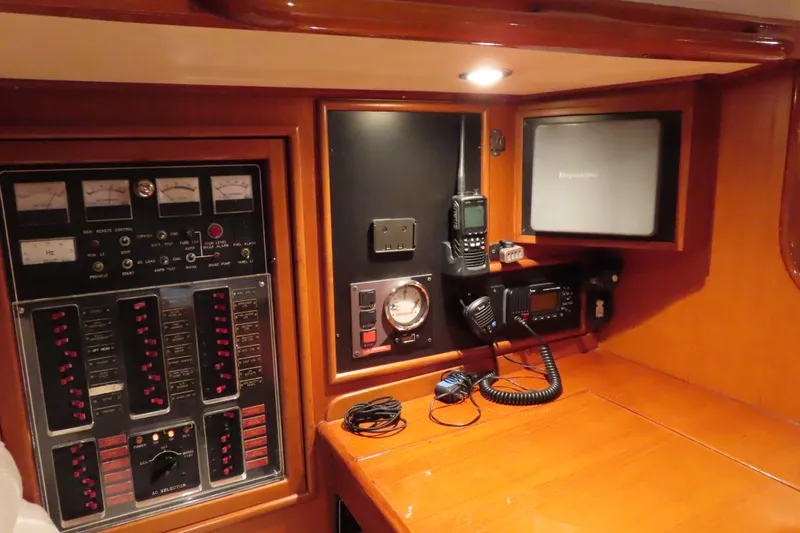Sea Pearl Yacht Photos Pics Control panel of a 1998 Hylas 54' yacht with navigation and communication equipment.