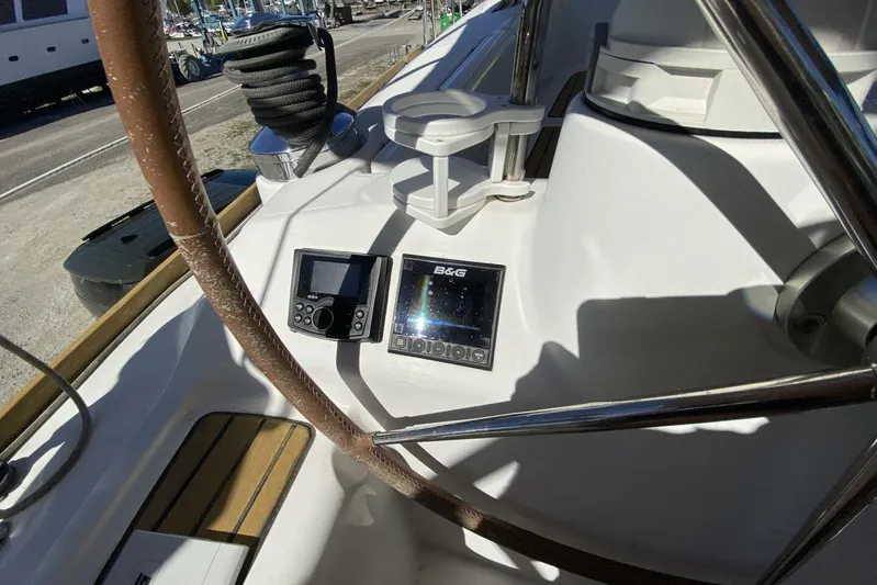 J'ouvert Yacht Photos Pics Cockpit of 2009 Beneteau 43 sailboat with navigation instruments and steering wheel.