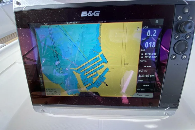 J'ouvert Yacht Photos Pics Navigation display on a 2009 Beneteau 43 sailboat, showing nautical chart and coordinates.