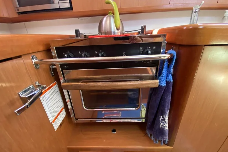 J'ouvert Yacht Photos Pics Galley kitchen in 2009 Beneteau 43 yacht with oven and kettle.