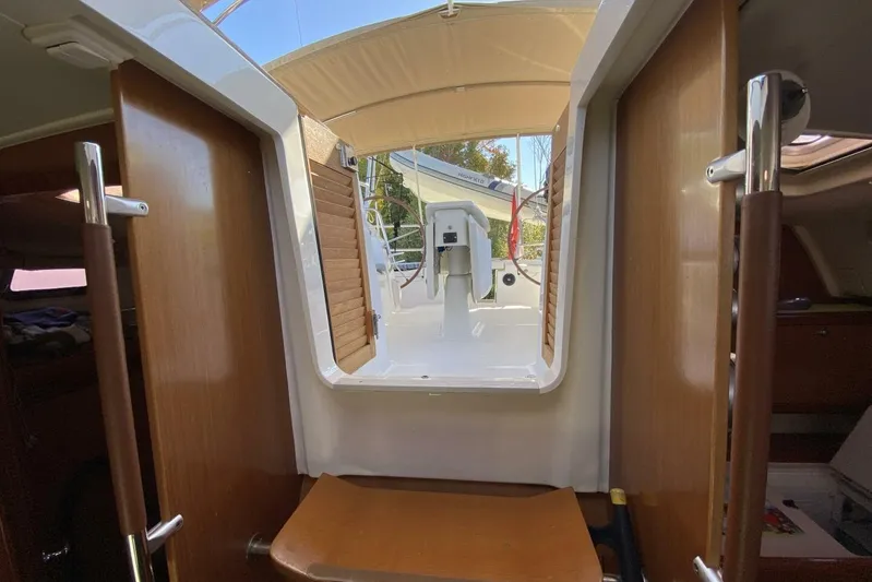 J'ouvert Yacht Photos Pics Interior view of 2009 Beneteau 43 sailboat, showcasing cabin entrance and cockpit area.