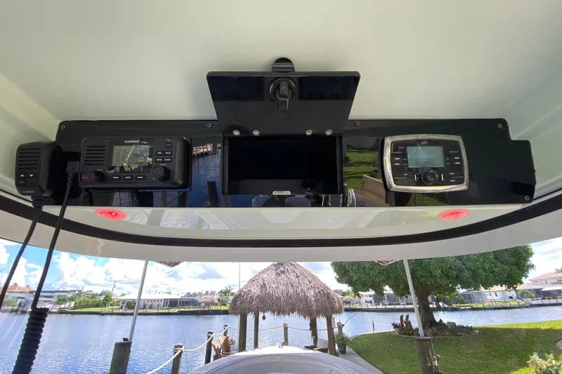 Pretty Fine Yacht Photos Pics 2015 Edgewater 320CC boat dashboard with Garmin and Polk audio systems.