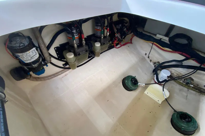 Pretty Fine Yacht Photos Pics 2015 Edgewater 320CC boat interior showing pumps and wiring setup.