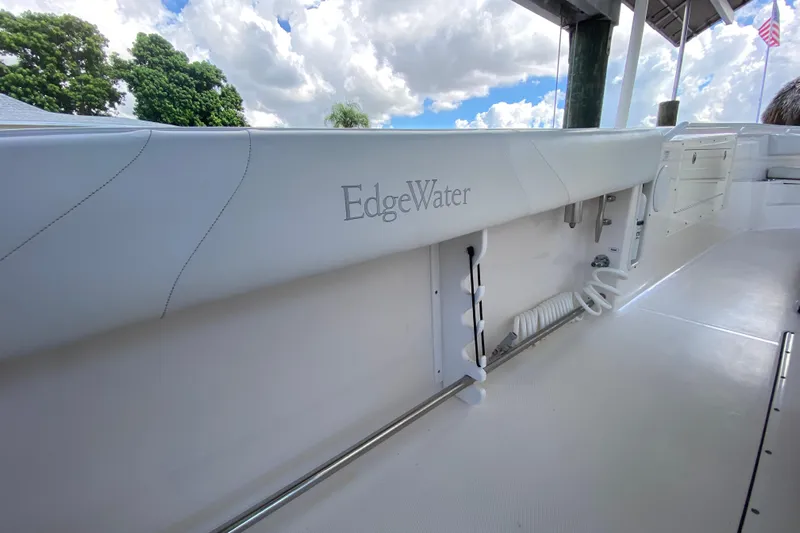Pretty Fine Yacht Photos Pics 2015 Edgewater 320CC boat interior with sleek white design and storage features.