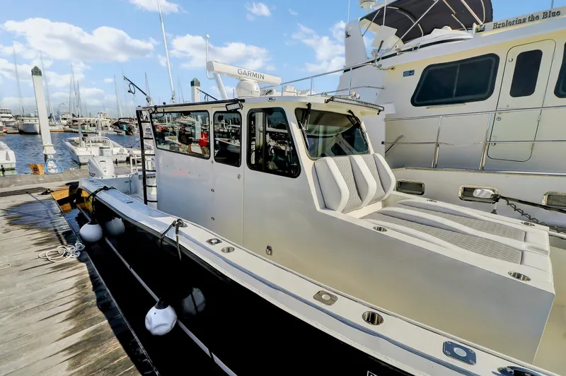 Our Trade Yacht Photos Pics Custom 2024 Nerowalker boat docked at marina, featuring sleek design and modern amenities.