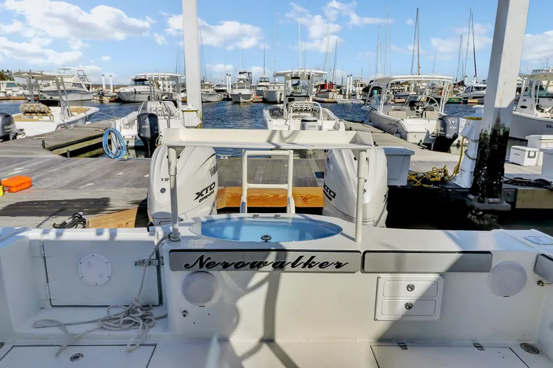 Our Trade Yacht Photos Pics Custom 2024 Nerowalker boat docked at marina with clear blue sky.
