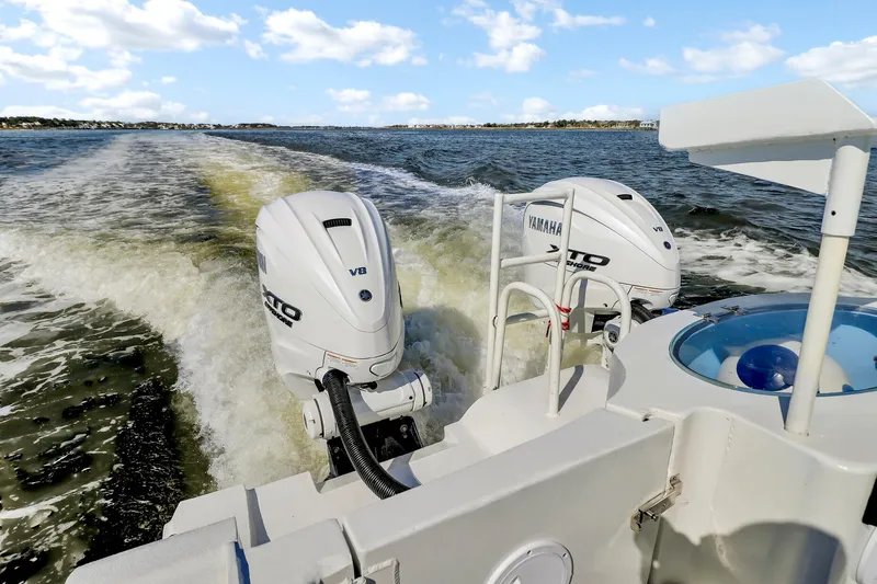 Our Trade Yacht Photos Pics Custom Nerowalker 2024 boat with dual Yamaha V8 outboard engines on open water.