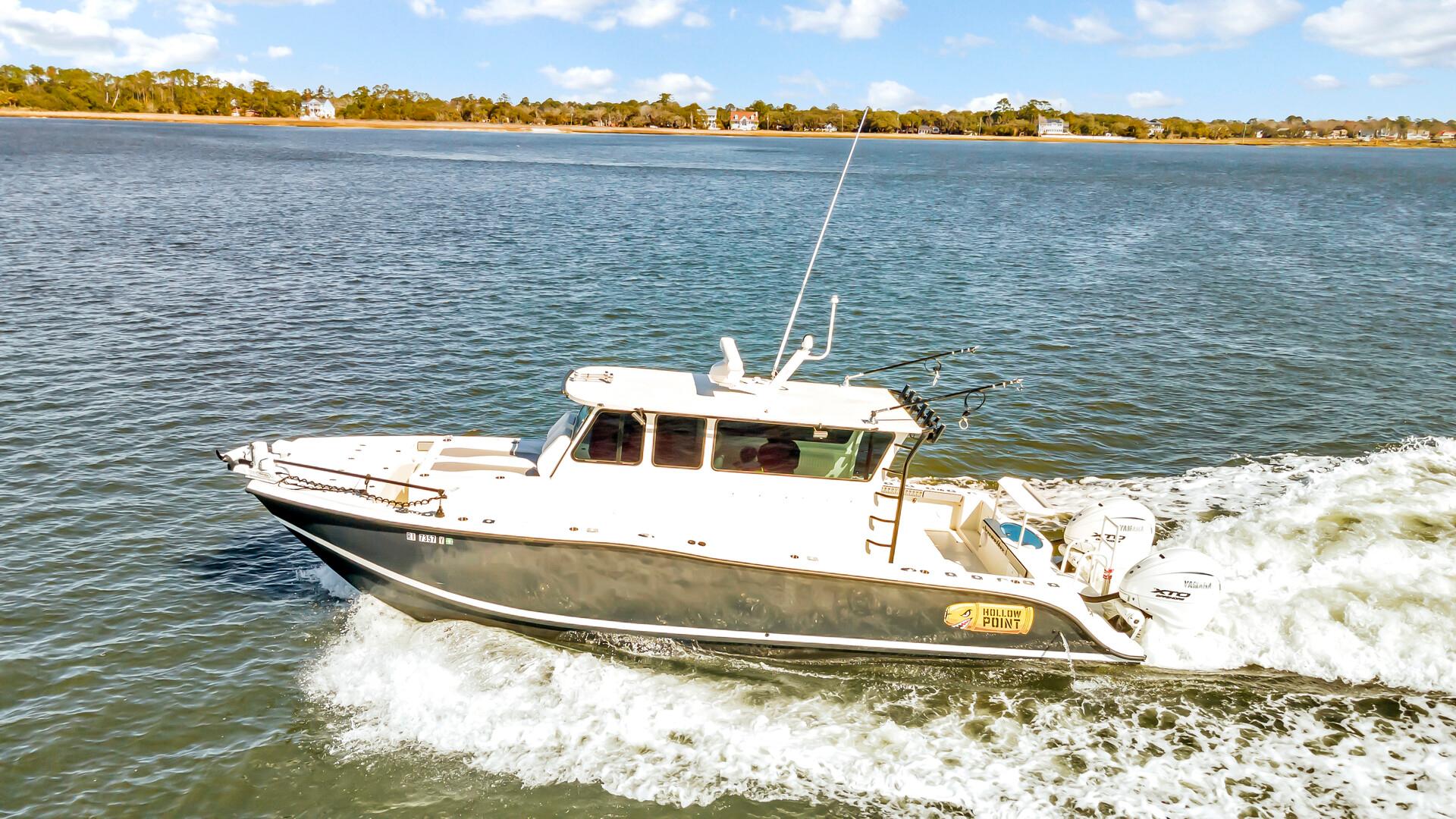 Custom Nerowalker 2024 boat cruising on a sunny day in open water.