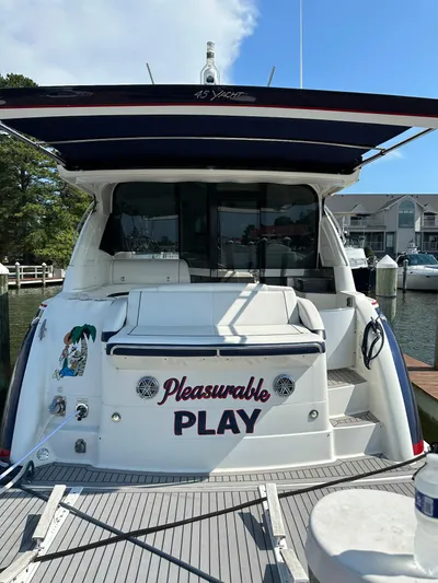  Yacht Photos Pics 2017 Formula 45 Yacht docked, rear view with "Pleasurable Play" name visible.