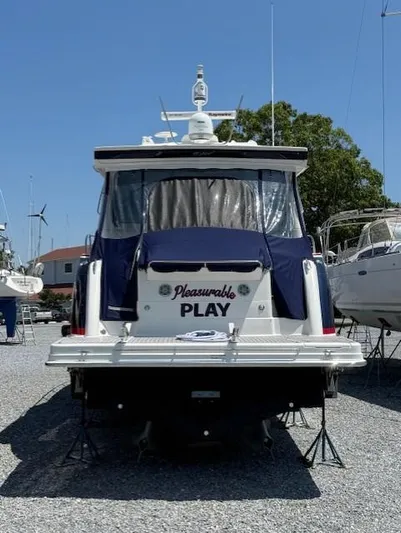  Yacht Photos Pics 2017 Formula 45 Yacht on dry dock, rear view with "Pleasurable Play" name.
