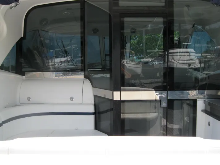  Yacht Photos Pics Interior view of a 2017 Formula 45 Yacht with seating and glass doors.