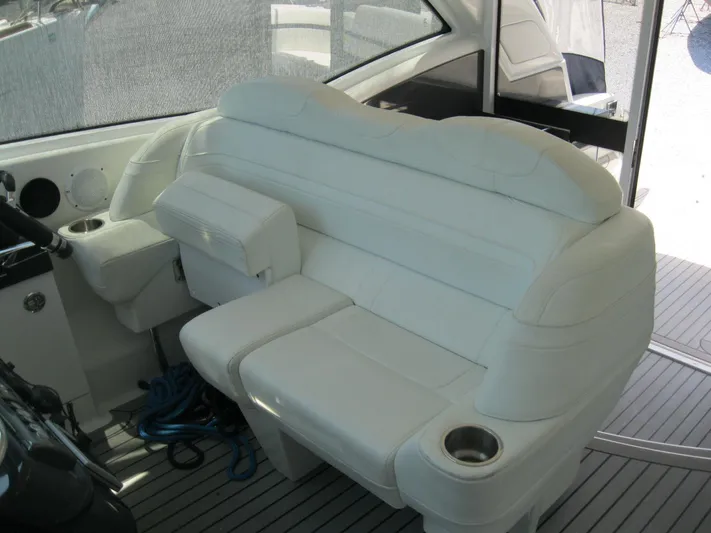  Yacht Photos Pics 2017 Formula 45 Yacht interior with white leather seating and cup holders.