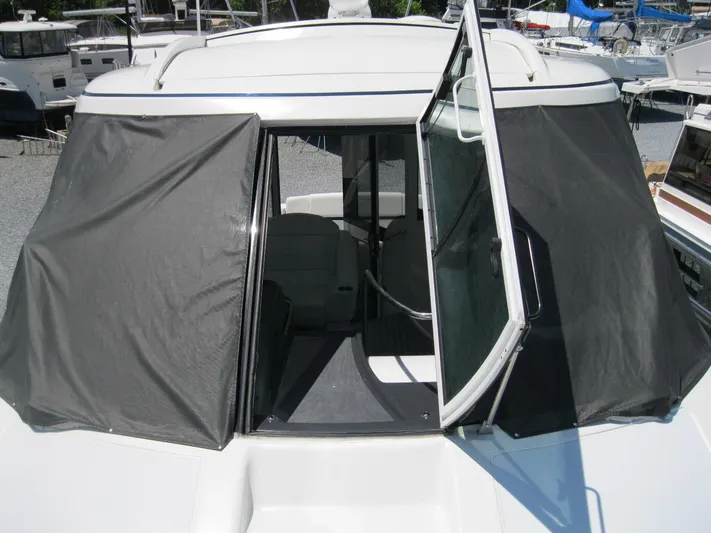  Yacht Photos Pics 2017 Formula 45 Yacht with open cabin door and black canvas covers.