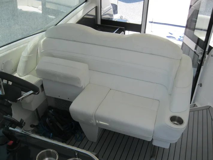  Yacht Photos Pics 2017 Formula 45 Yacht interior with white leather seating and cup holder.