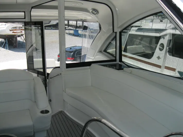  Yacht Photos Pics Interior of 2017 Formula 45 Yacht with white seating and large windows.