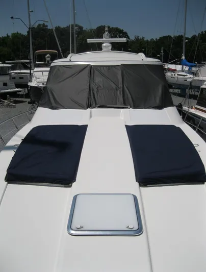  Yacht Photos Pics 2017 Formula 45 Yacht with sun pads and covered windshield in marina.