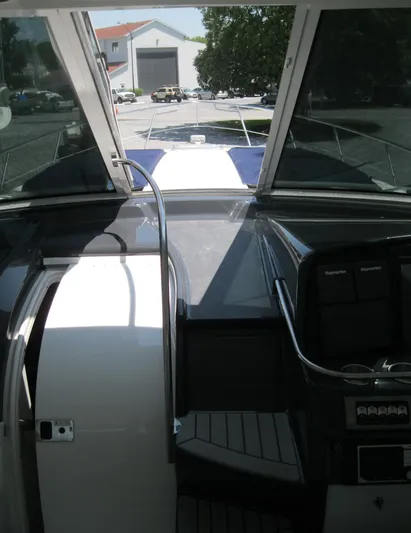  Yacht Photos Pics Interior view of a 2017 Formula 45 Yacht cockpit with open hatch and dashboard.