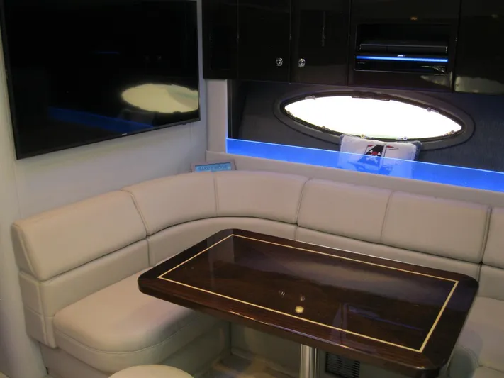  Yacht Photos Pics Luxurious interior of 2017 Formula 45 Yacht with plush seating and elegant table.