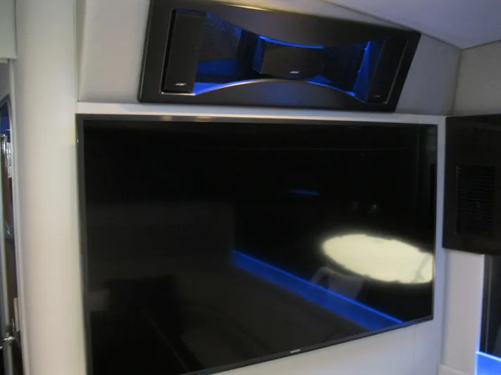  Yacht Photos Pics Entertainment system with a large screen and speaker on a 2017 Formula 45 Yacht.