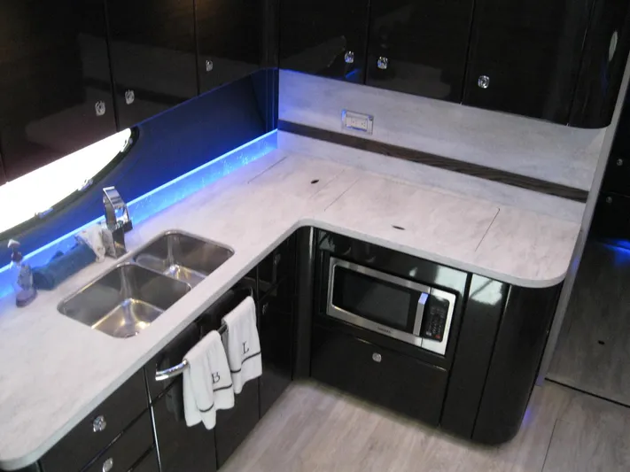  Yacht Photos Pics Modern kitchen in 2017 Formula 45 Yacht with sleek countertops and stainless steel appliances.