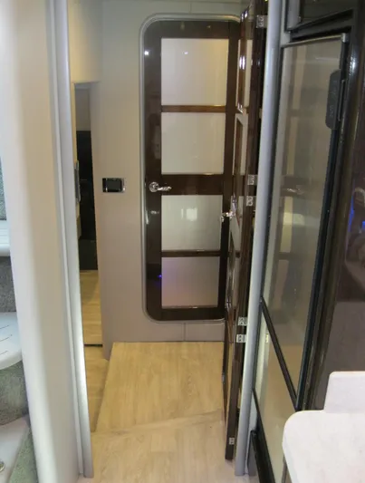  Yacht Photos Pics Interior hallway of a 2017 Formula 45 Yacht with modern design and wooden accents.