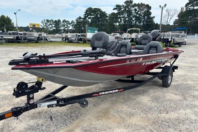 2023 Tracker Pro Team 175 TXW boat on trailer, parked outdoors.