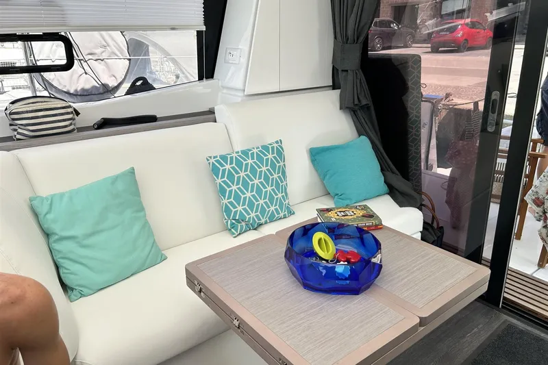  Yacht Photos Pics Interior of 2025 Fountaine Pajot MY4.S yacht with modern seating and decor.