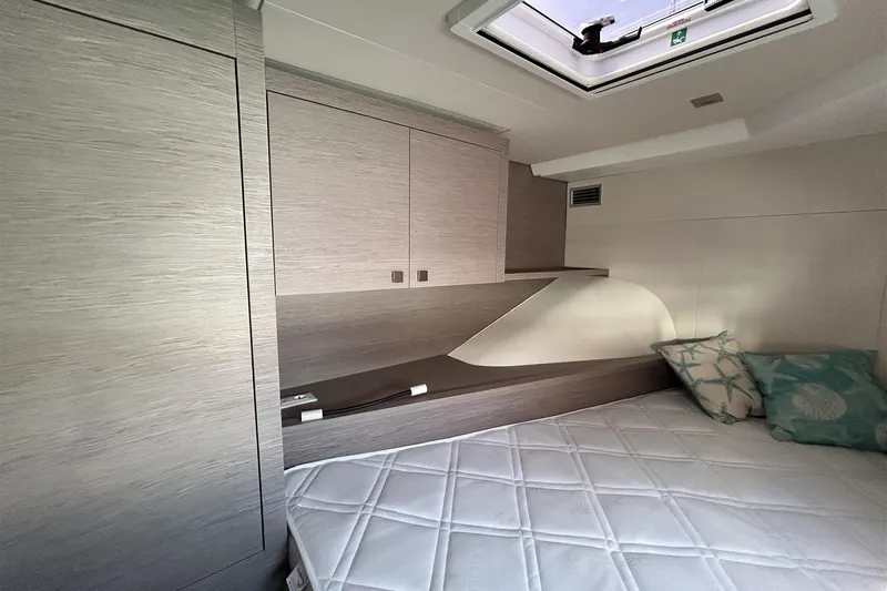  Yacht Photos Pics 2025 Fountaine Pajot MY4.S cabin interior with modern design and comfortable bedding.