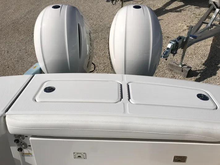 Regulator 23 Carolina Blue Yacht Photos Pics 2023 Regulator 23 boat with dual outboard engines, viewed from the rear.