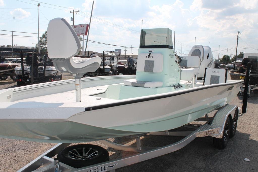 2026 Excel Bay Pro Elite 203 boat on trailer, featuring sleek design and modern seating.