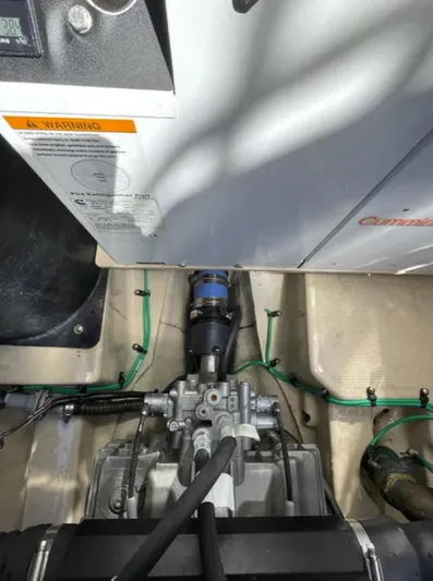 Elaine Hope Yacht Photos Pics Engine compartment of a 2017 Cutwater C-30 CB boat, showcasing mechanical components and wiring.