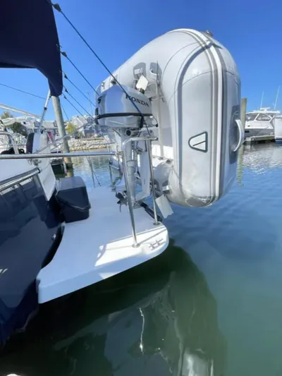 Elaine Hope Yacht Photos Pics 2017 Cutwater C-30 CB with attached inflatable dinghy at marina.