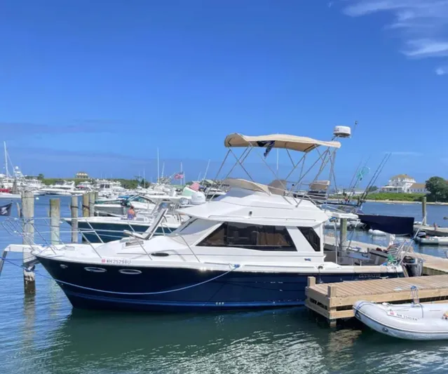 Elaine Hope Yacht Photos Pics 2017 Cutwater C-30 CB boat docked at marina under clear blue sky.