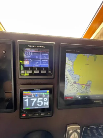 Elaine Hope Yacht Photos Pics Dashboard of a 2017 Cutwater C-30 CB boat with navigation and control displays.