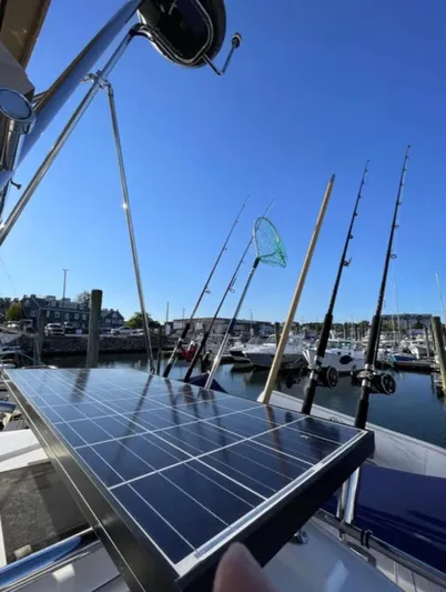 Elaine Hope Yacht Photos Pics 2017 Cutwater C-30 CB boat with solar panel and fishing rods at marina.