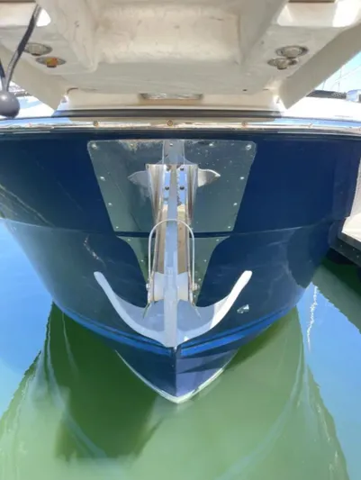 Elaine Hope Yacht Photos Pics 2017 Cutwater C-30 CB boat, front view with anchor, docked in calm water.