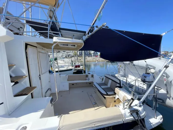 Elaine Hope Yacht Photos Pics 2017 Cutwater C-30 CB boat with spacious deck and seating, docked at marina.