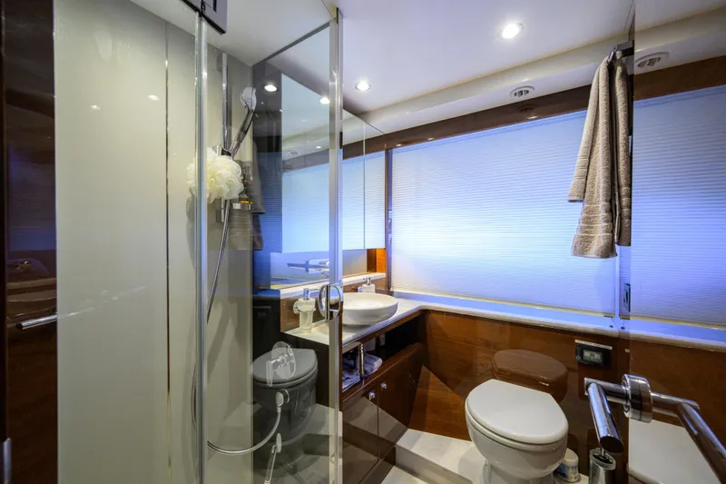 Miss Amy Yacht Photos Pics Luxurious bathroom in 2020 Princess F70 yacht with modern fixtures and elegant design.