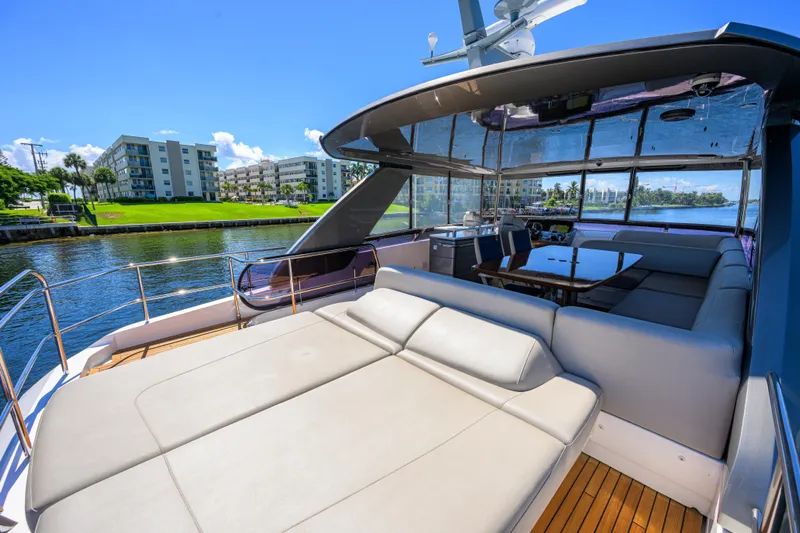 Miss Amy Yacht Photos Pics Luxurious 2020 Princess F70 yacht interior with spacious seating and waterfront view.